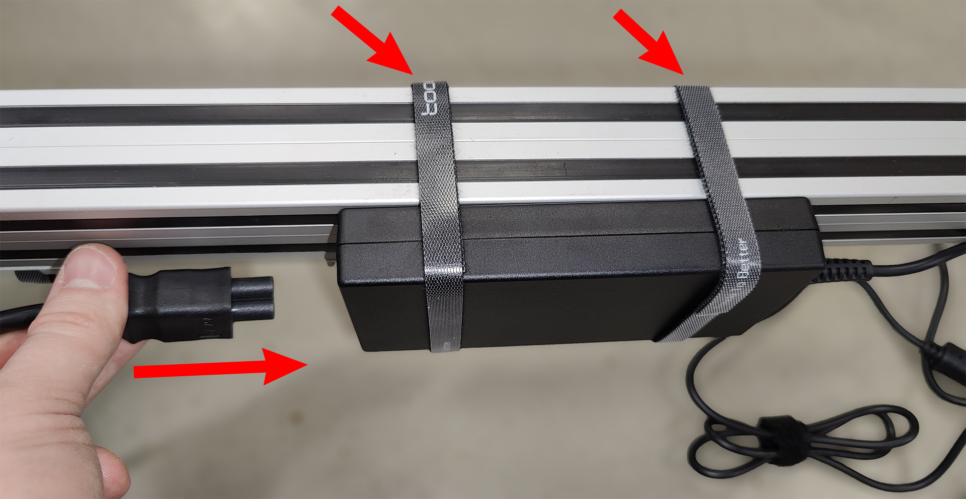 Attaching and connecting the laptop power supply Attaching and connecting the laptop power supply